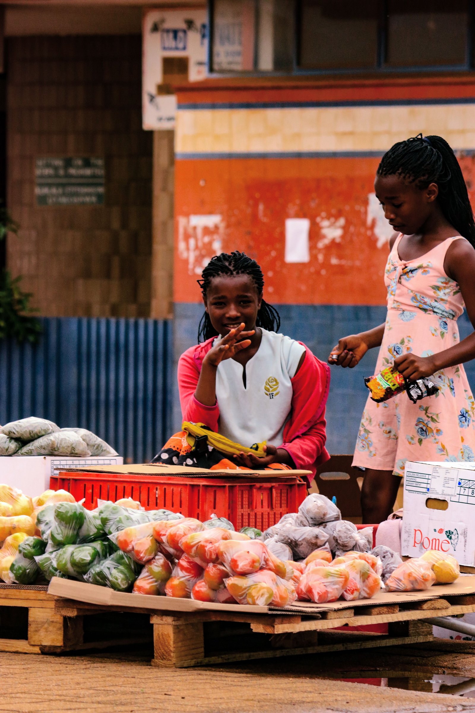 Woman selling fresh produce at her market stall
