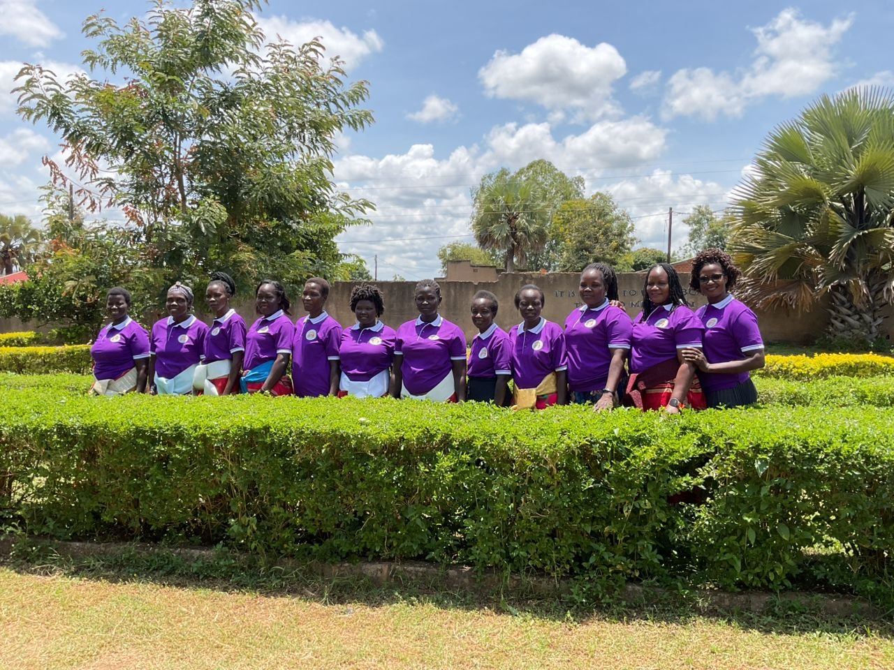 Remnant Mothers together in their purple mission shirts
